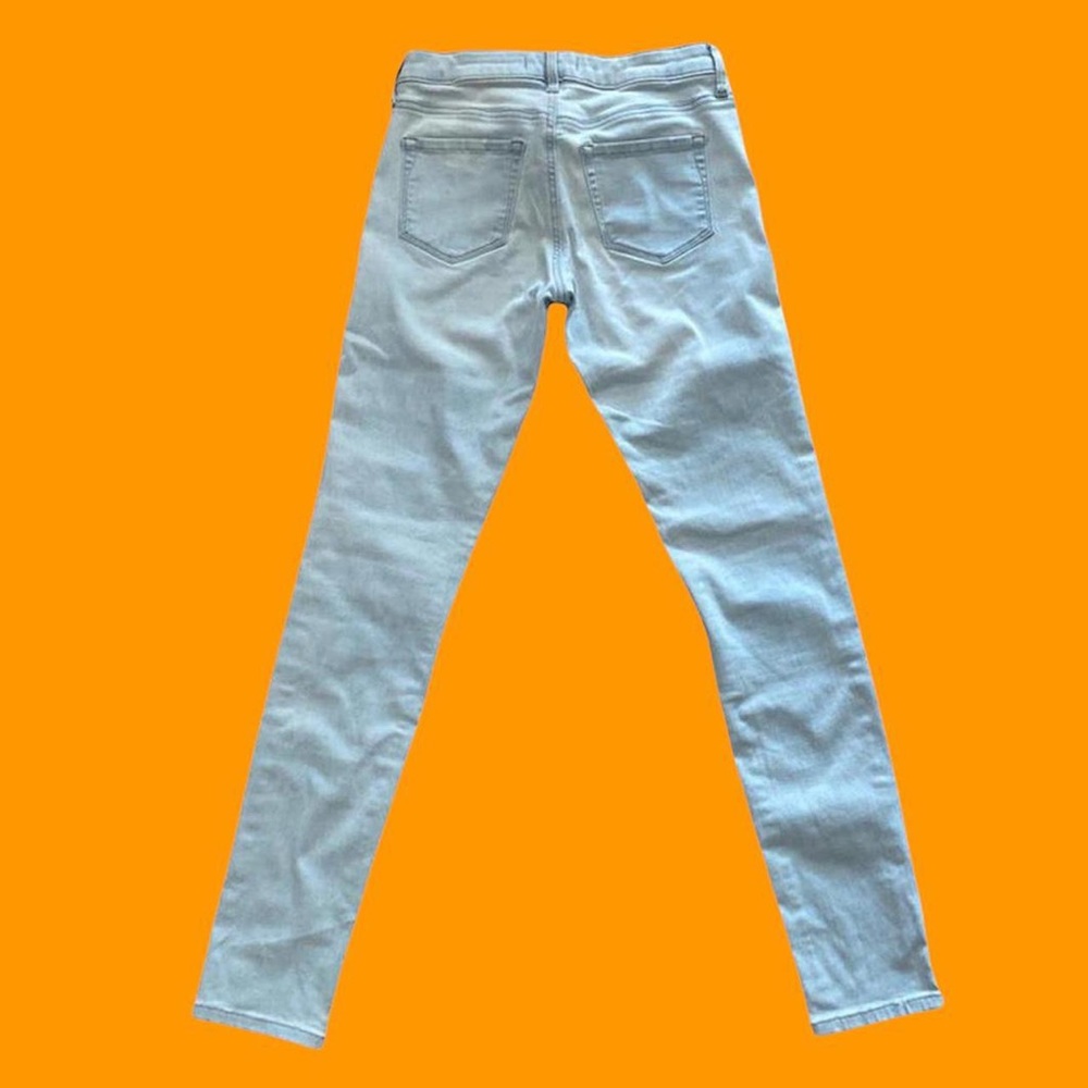 UNIQLO Mid Rise Light Wash Skinny Jeans